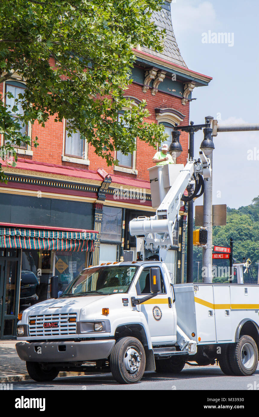 Pennsylvania,PA,Northeastern,Easton,Lehigh Valley,Northampton Street,historic downtown,preservation,restoration,building,truck public works,man men ma Stock Photo