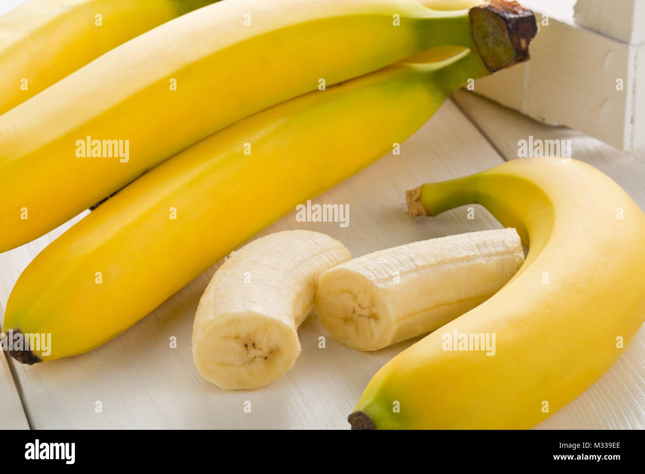 Download Bundle Of Fresh Ripe Yellow Bananas With Sliced Banana Pieces On Stock Photo Alamy PSD Mockup Templates