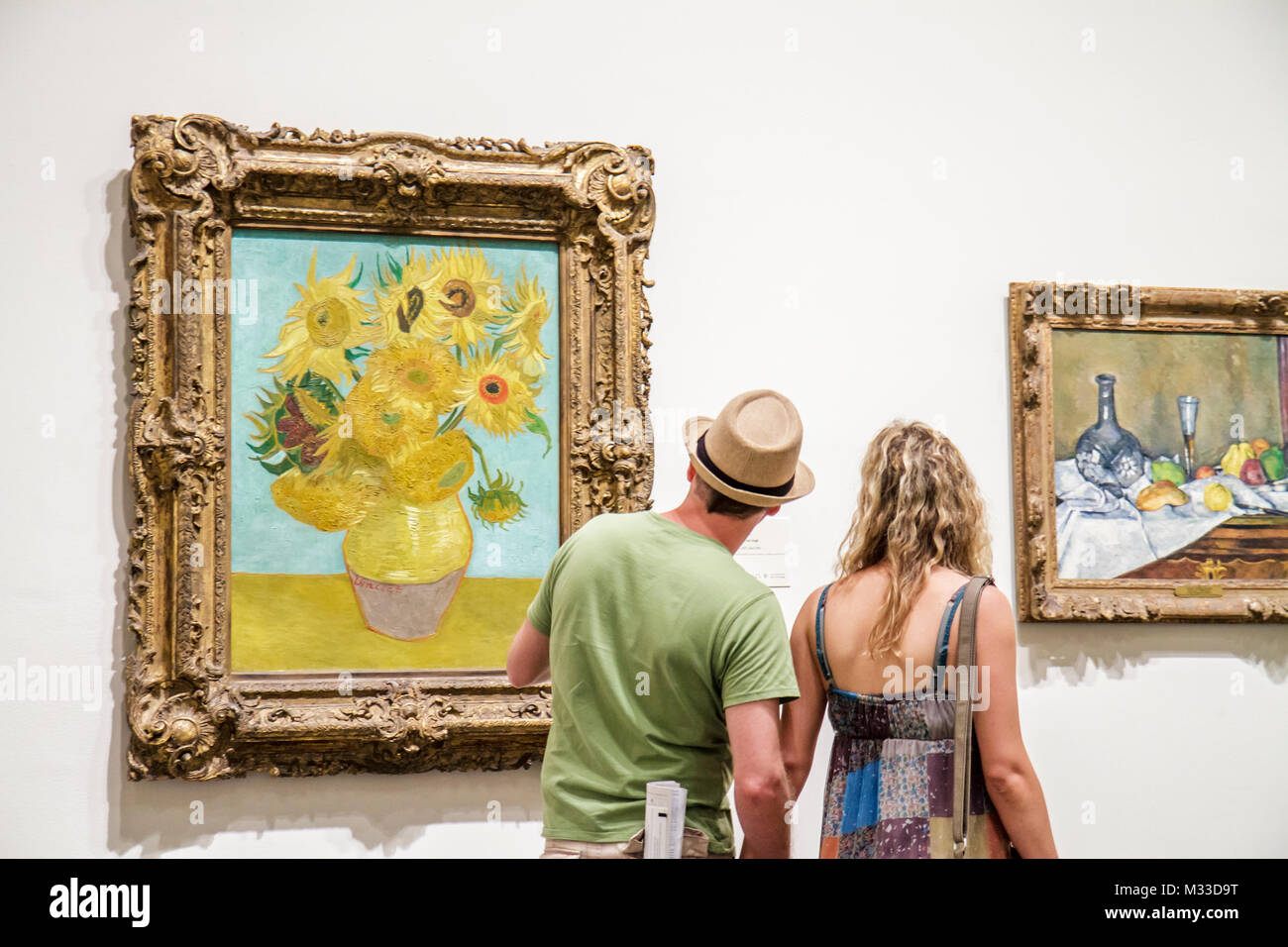 Philadelphia Pennsylvania,Museum of Art collection,paintings Sunflowers Vincent van Gogh,Still Life a Dessert Paul Cézanne,man woman couple looking Stock Photo
