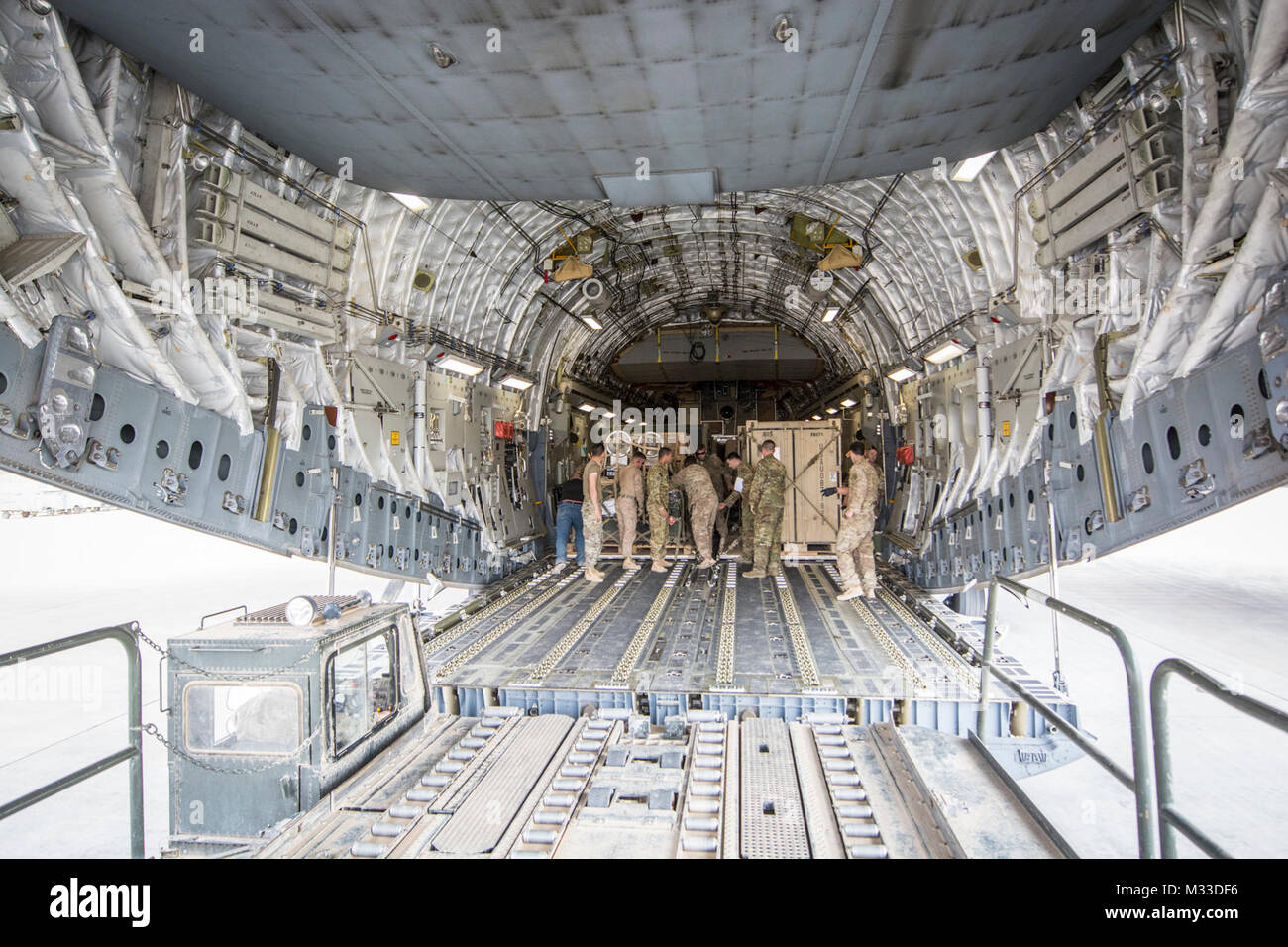 Equipment is loaded into the cargo bay of a C17 Globemaster III
