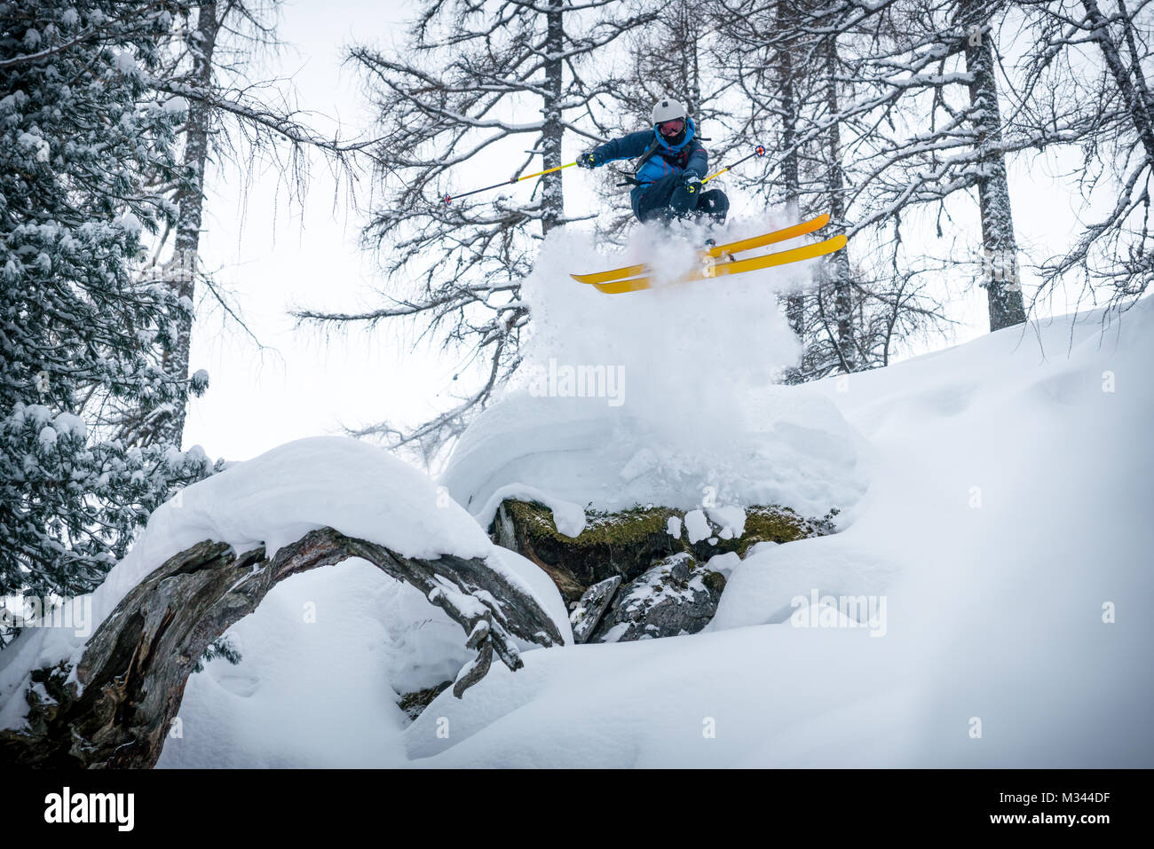 Freeride skier jumping mid air, Zauchensee, Alps, Salzburg, Austria Stock Photo
