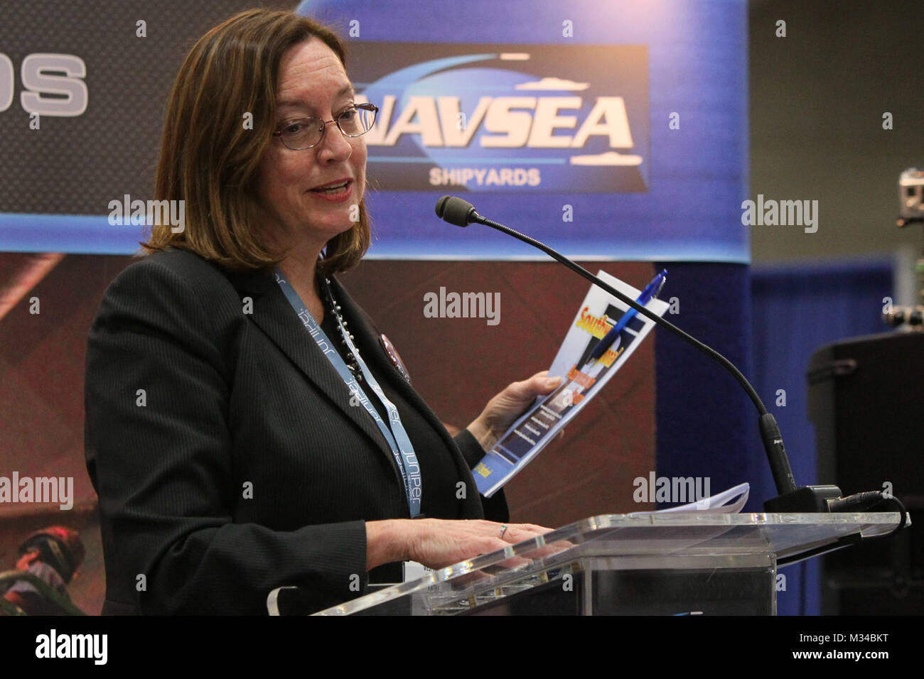 150211-N-HW977-656 SAN DIEGO, Calif. (Feb. 11, 2015) Kathy Tyner, Southwestern College vice president, speaks during WEST 2015 about the Southwest Regional Apprentice Program offered at her institution. The program is managed by Puget Sound Naval Shipyard and Intermediate Maintenance Facility, and is designed to allow participants to earn a college degree and learn a new trade, all while working at U.S. Naval shipyards on significant national assets. (U.S. Navy photo by Greg Vojtko/Released) 150211-N-HW977-656 by NAVSEA Corona Stock Photo