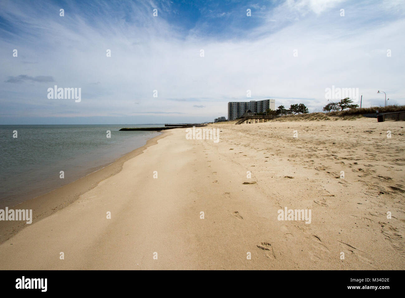 NORFOLK, Va. – Nearly seven miles of beach along the Willoughby Spit and East Ocean View areas of the city will expand by 60 feet through a partnership between the city of Norfolk and the Norfolk District, U.S. Army Corps of Engineers. The $18.5 million project will provide shoreline protection to the city in an area that is susceptible to coastal flooding during nor’easters and hurricanes.  (U.S. Army photo/Patrick Bloodgood) 150330-A-OI229-006 by norfolkdistrict Stock Photo