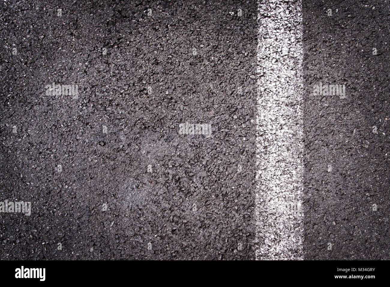 Asphalt road top view with a white line Stock Photo