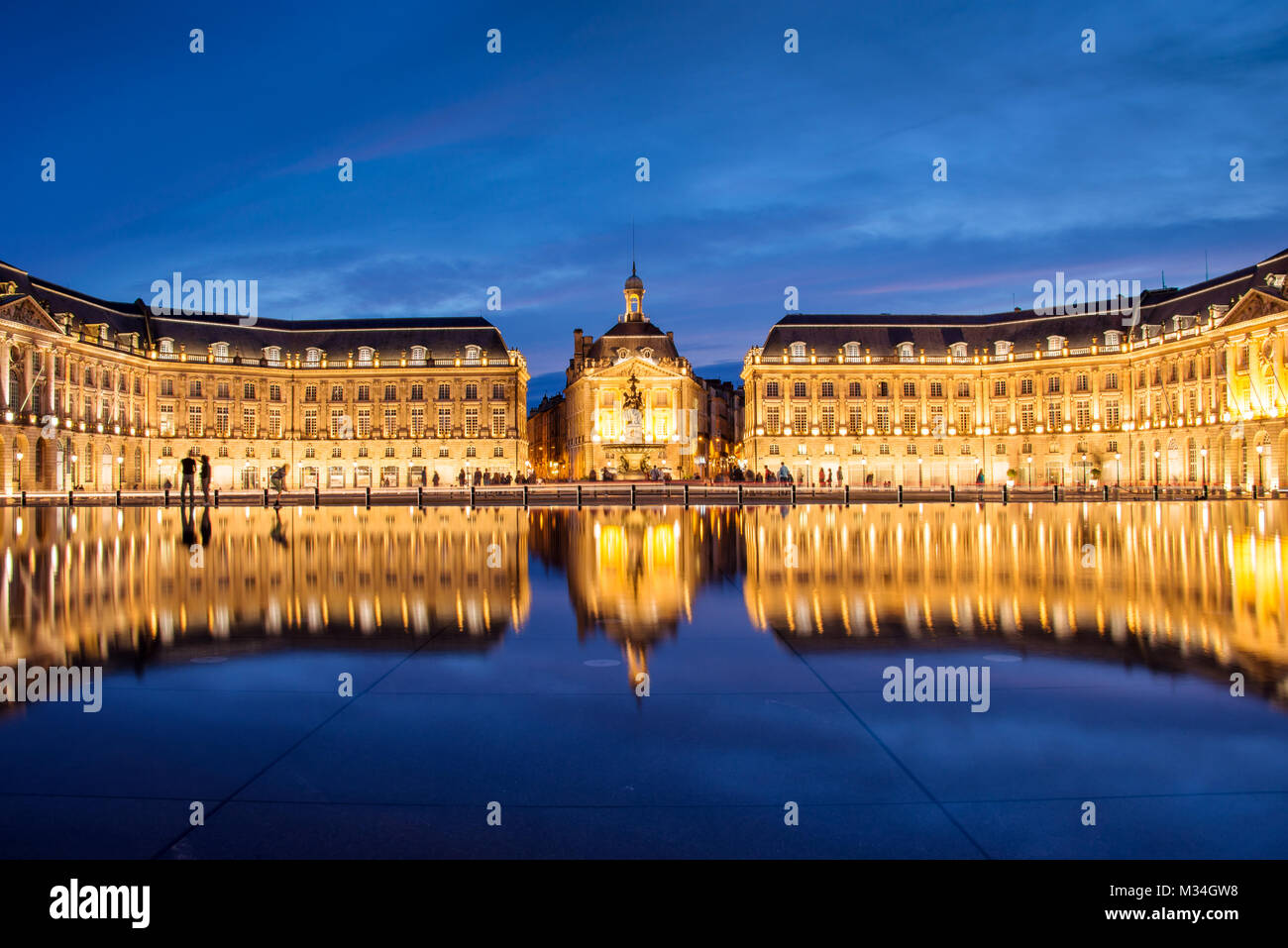 Place la Bourse in Bordeaux, the water mirror by night, France Stock Photo