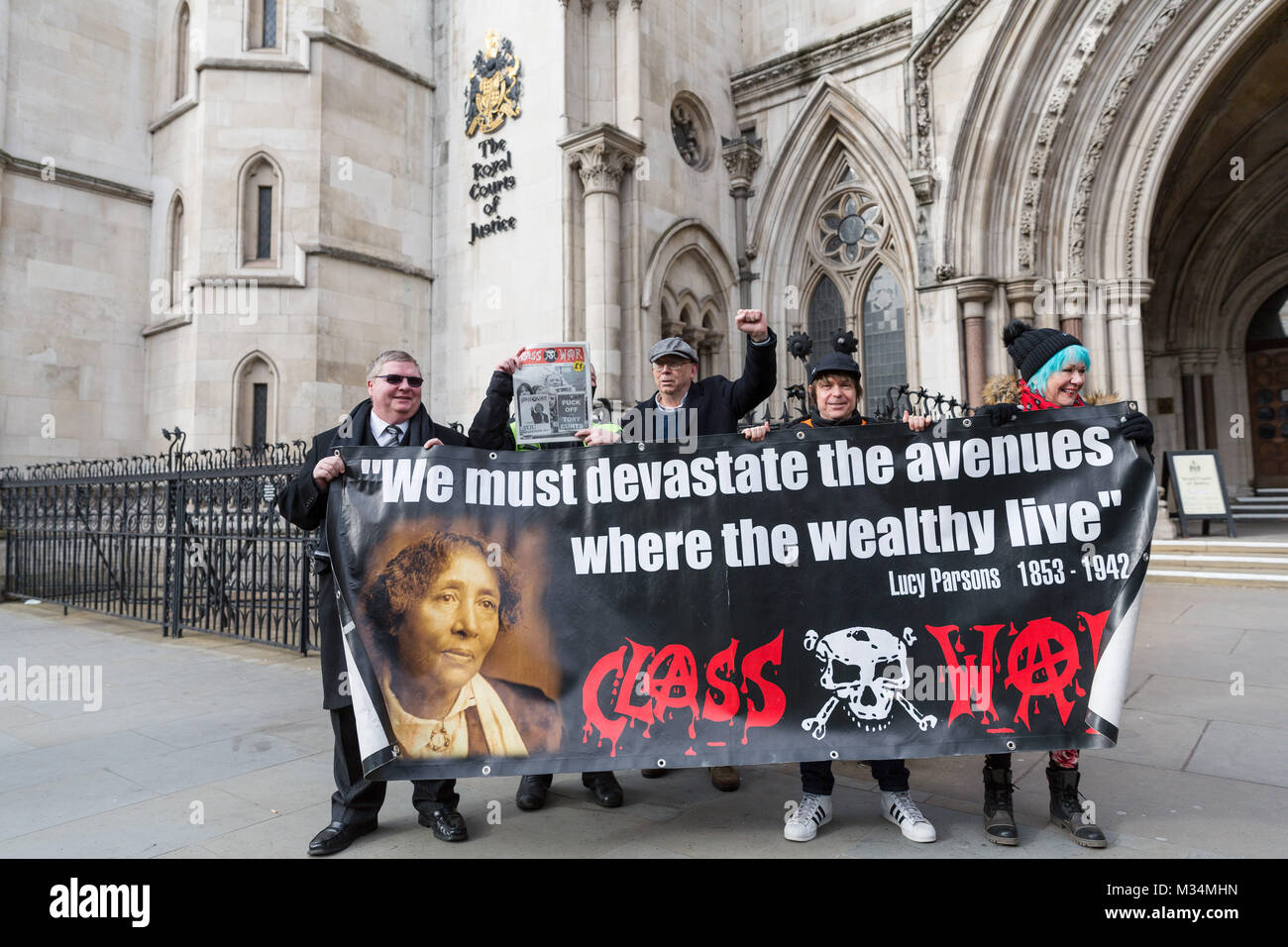 London, UK. 8th February 2018. Class War founder and veteran anarchist, Ian Bone with Class War members outside the High Court in London after winning their court case. The Qatari royal owners of the Shard, via Management Company Teighmore Limited, sought a high court injunction to prevent protests against empty housing led by veteran anarchist founder and leader Ian Bone, 70, of the campaign group newspaper Class War, Credit: Vickie Flores/Alamy Live News Stock Photo