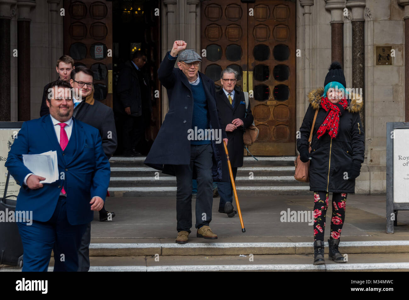 February 8, 2018 - London, UK. 8th February 2018. Ian Bone celebrates in the pub opposite the High Court after stopping an attempt by lawyers acting for the Qatari royal family to prevent a Class War protest against the ten empty Â£50million pound apartments in The Shard. They had tried to get an injunction against protests by Bone and ''persons unknown'' and to claim over Â£500 in legal costs from the 70 year-old south London pensioner, but had then offered to drop the case if Class War 'would stop attacking the Shard'. Their attempt to stifle protest was covered in national and international Stock Photo