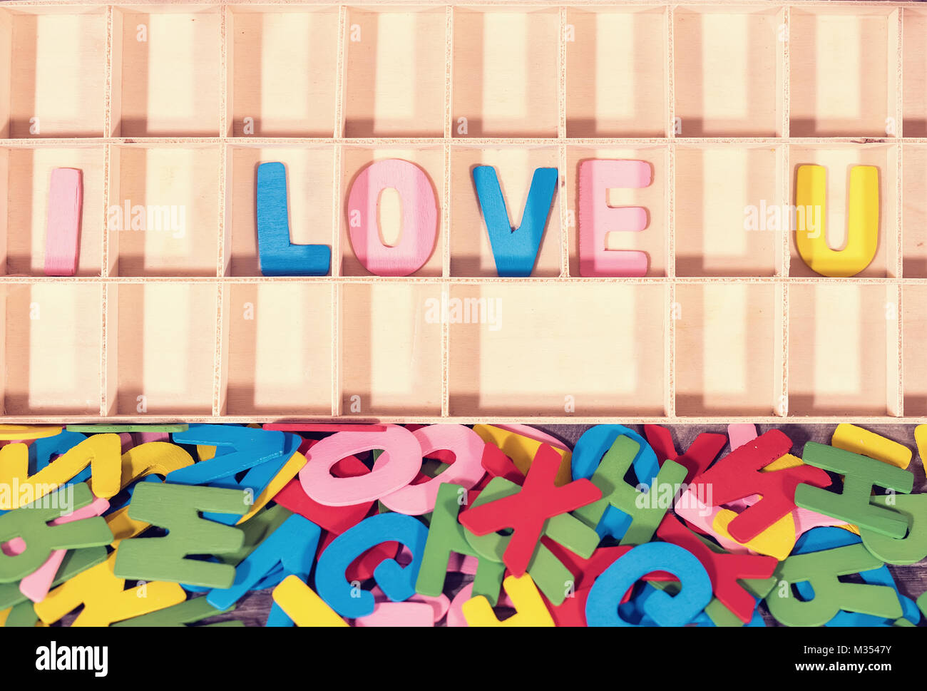 love spell with Wooden alphabet blocks Stock Photo