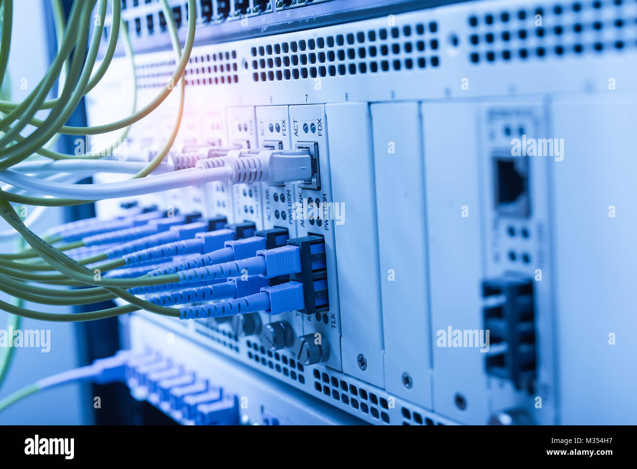 Fiber cables connected to optic ports and UTP, Network cables connected