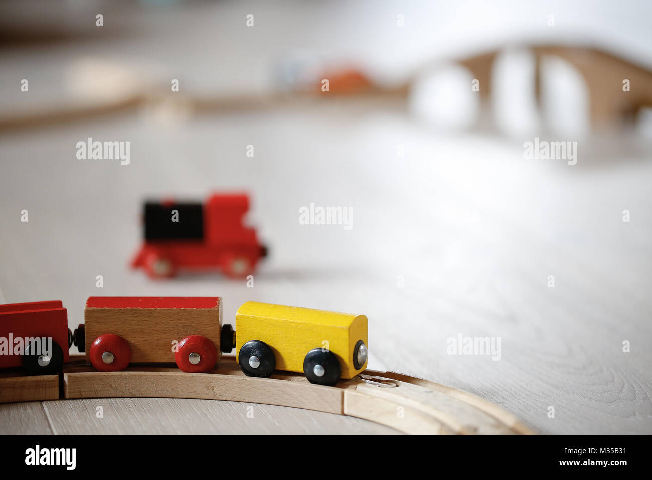 Wooden train toys. Educational and natural toys, learning through