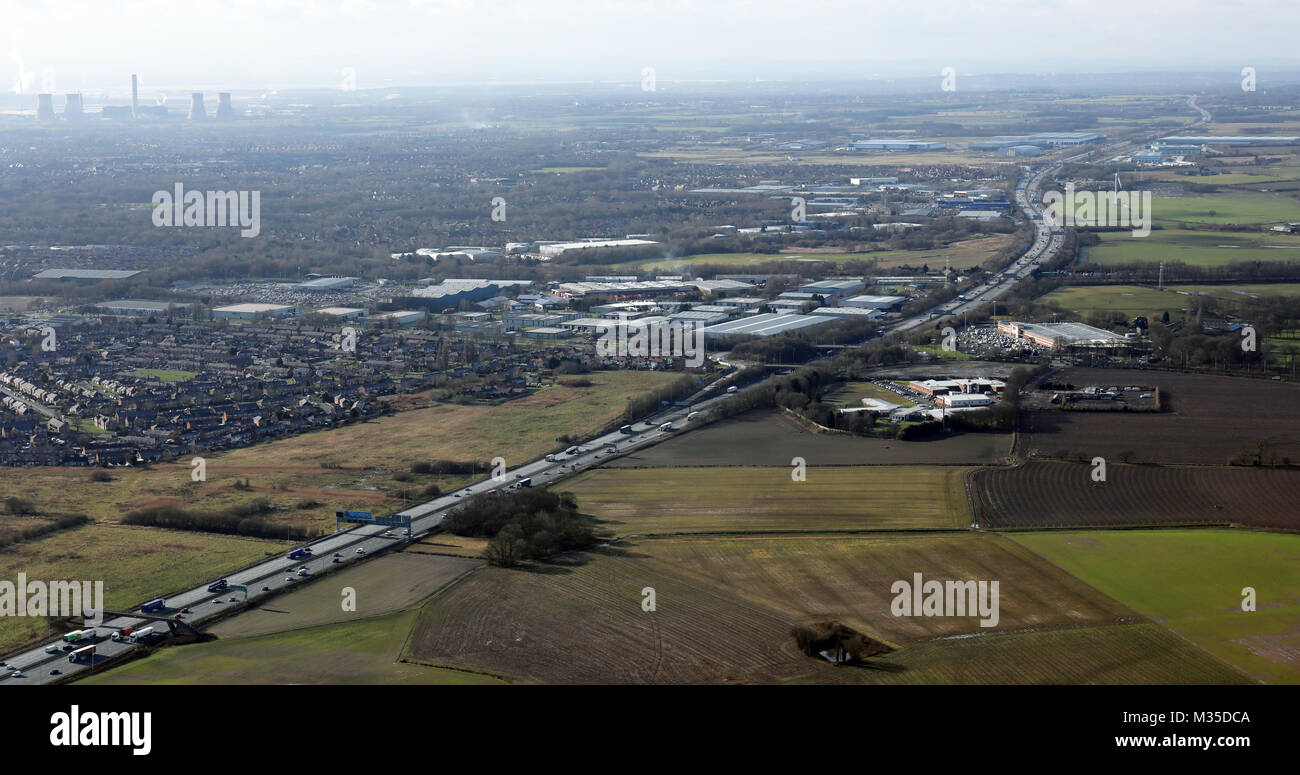 aerial view looking east along M62 at Warrington, UK Stock Photo