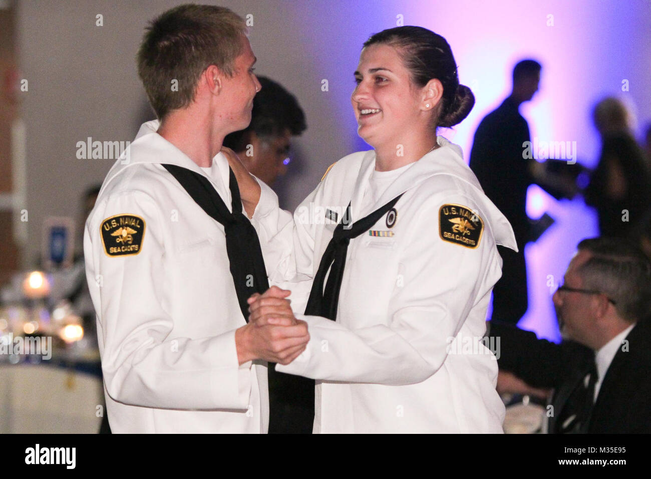 151017-N-HW977-734 RIVERSIDE, Calif. (Oct. 17, 2015) A pair of U.S. Naval Sea Cadets dance during the inaugural Inland Empire Navy Birthday Ball. The sold-out event, to commemorate the Navy's 240th birthday, included dinner, ceremonies, music, dancing and a keynote address by U.S. Representative Ken Calvert (R-Corona). All proceeds will benefit the Navy-Marine Corps Relief Society. (U.S. Navy photo by Greg Vojtko/Released) by NAVSEA Corona Stock Photo