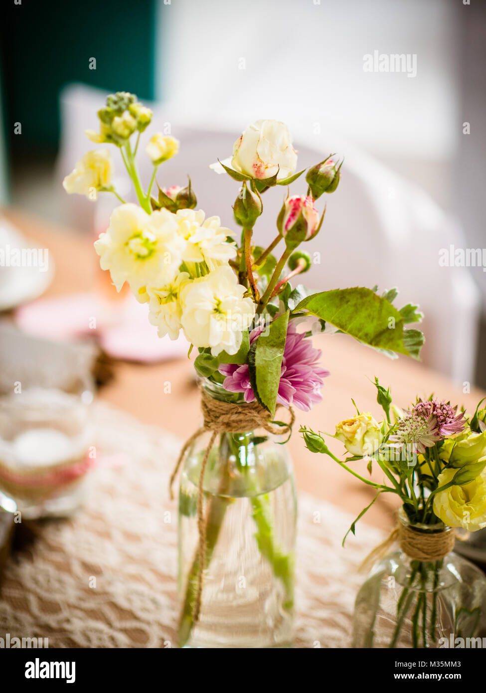the small table decoration with wildflowers, natural and subtle