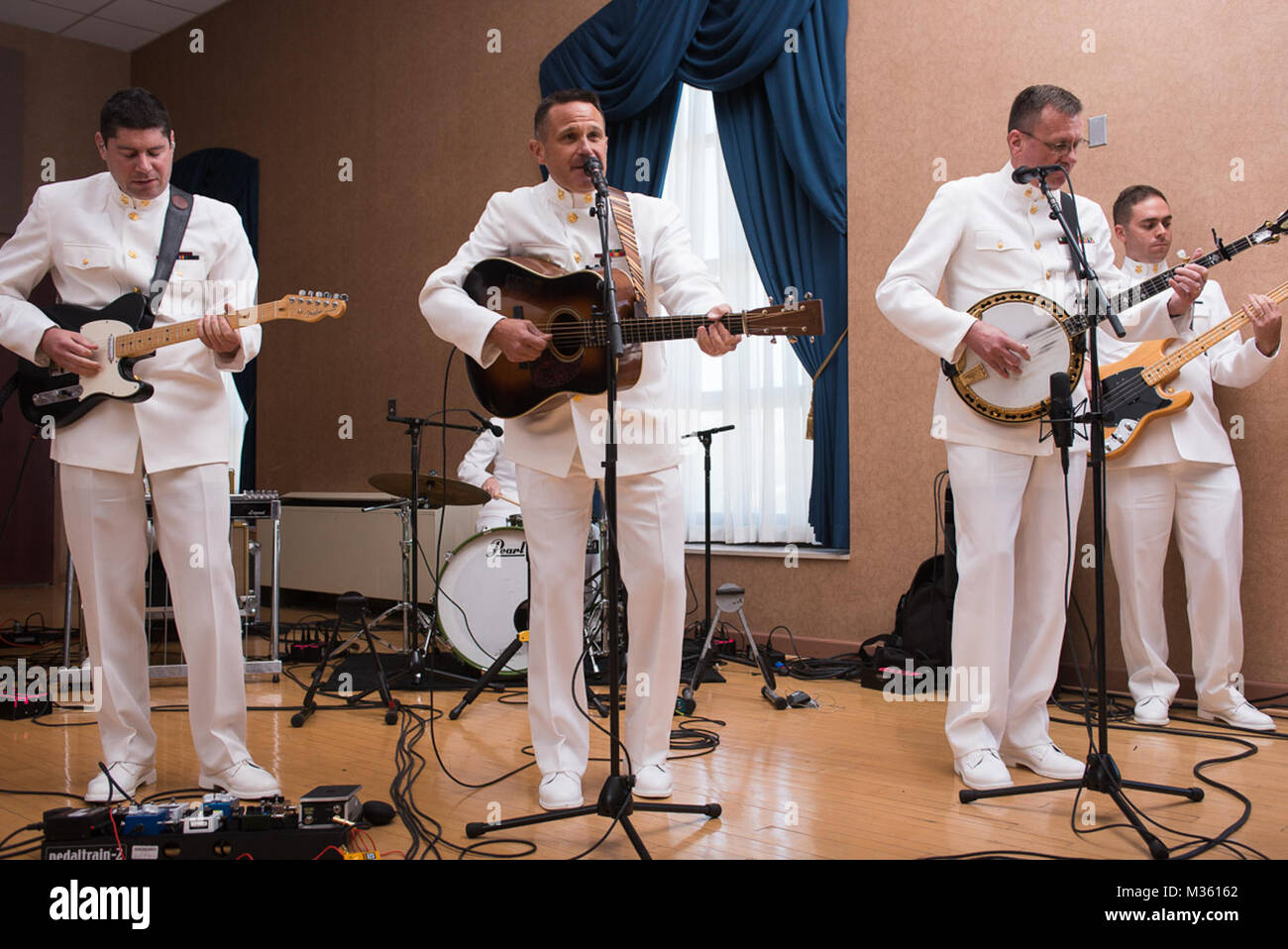 150724-N-DD694-020 WASHINGTON (July 24, 2015) The United States Navy Band Country Current performs at the retirement ceremony of Captain Brian Walden. Capt. Walden was the commanding officer of the United States Navy Band and retired after 35 years of service. (U.S. Navy photo by Musician 1st Class Jonathan Barnes/Released) 150724-N-DD694-020 by United States Navy Band Stock Photo