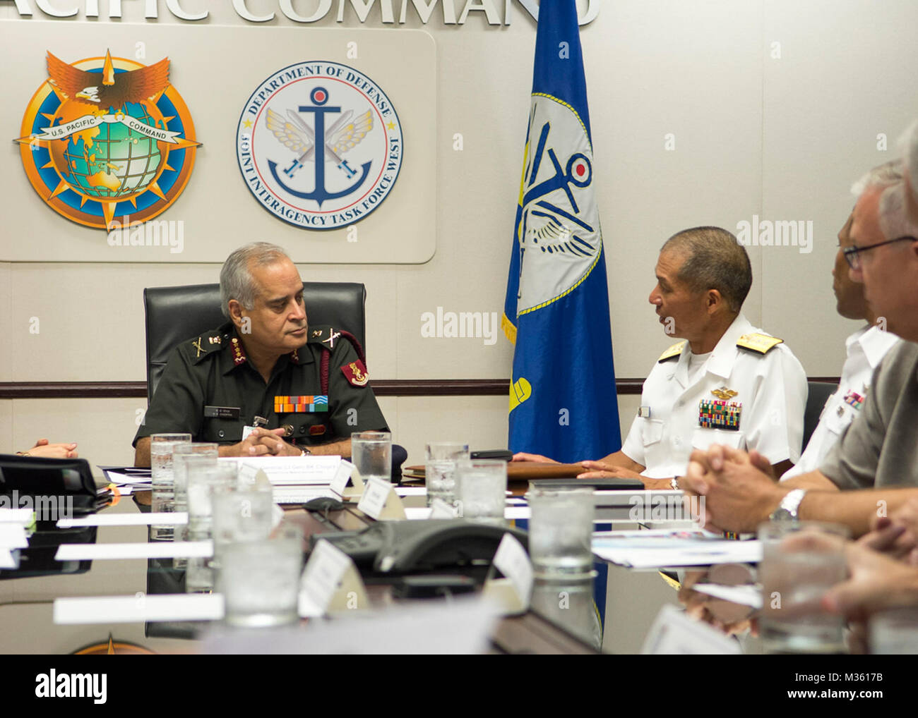 150728-N-DX698-010 CAMP H.M. SMITH, Hawaii (July 28, 2015) Lt. Gen. BK Chopra, Indian Director General Armed Forces Medical Services, left, Rear Adm. Colin G. Chen, command surgeon of U.S. Pacific Command (USPACOM) and staff members discuss the cooperation between U.S. medical units and India medical force. This is the first India official to visit USPACOM to build relationships and explore future health engagements. (U.S. Navy photo by Mass Communication Specialist 1st Class Jay M. Chu/Released) Indian Director General Armed Forces Medical Services Visits PACOM by #PACOM Stock Photo