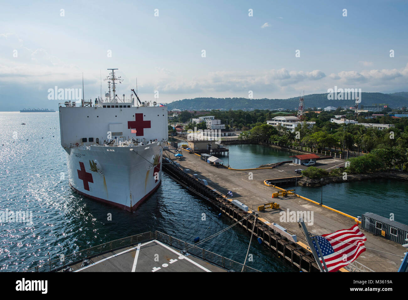 SUBIC BAY, Philippines (Aug 4, 2015) The hospital ship USNS Mercy (T-AH 19) is moored at Subic Bay during Pacific Partnership 2015. Mercy is currently in the Philippines for its third mission port of PP15. Pacific Partnership is in its tenth iteration and is the largest annual multilateral humanitarian assistance and disaster relief preparedness mission conducted in the Indo-Asia-Pacific region. While training for crisis conditions, Pacific Partnership missions to date have provided real world medical care to approximately 270,000 patients and veterinary services to more than 38,000 animals. C Stock Photo