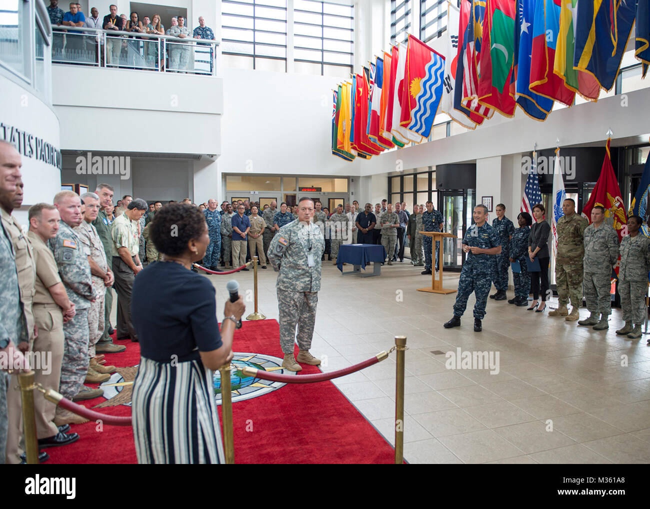 150806-N-DX698-074 CAMP H.M. SMITH (Aug. 6, 2015) Adm. Harry B. Harris, Jr., commander of U.S. Pacific Command, holds an awards ceremony and all-hands call at Pacific Command headquarters. Harris gave updates on events he conducted in the Pacific region including the Shangri-La Dialogue and the Military Child Education Coalition seminar. (U.S. Navy photo by Mass Communication Specialist 1st Class Jay M. Chu/Released) PACOM Commander Holds Awards Ceremony and All-Hands Call by #PACOM Stock Photo