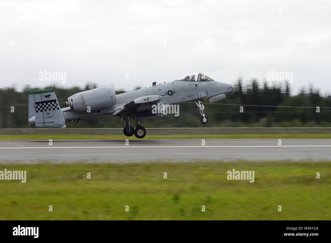 A U.S. Air Force A-10 Thunderbolt II assigned to the 25th Fighter Squadron, Osan Air Base, Republic of Korea, takes off from Eielson Air Force Base, Alaska, Aug. 10, 2015, during RED FLAG-Alaska (RF-A) 15-3. RF-A is a series of Pacific Air Forces commander-directed field training exercises for U.S. and partner nation forces, providing combined offensive counter-air, interdiction, close air support and large force employment training in a simulated combat environment. (U.S. Air Force photo by Senior Airman Ashley Nicole Taylor/Released) A-10 Thunderbolt Takes Off for Field Training Exercise dur Stock Photo