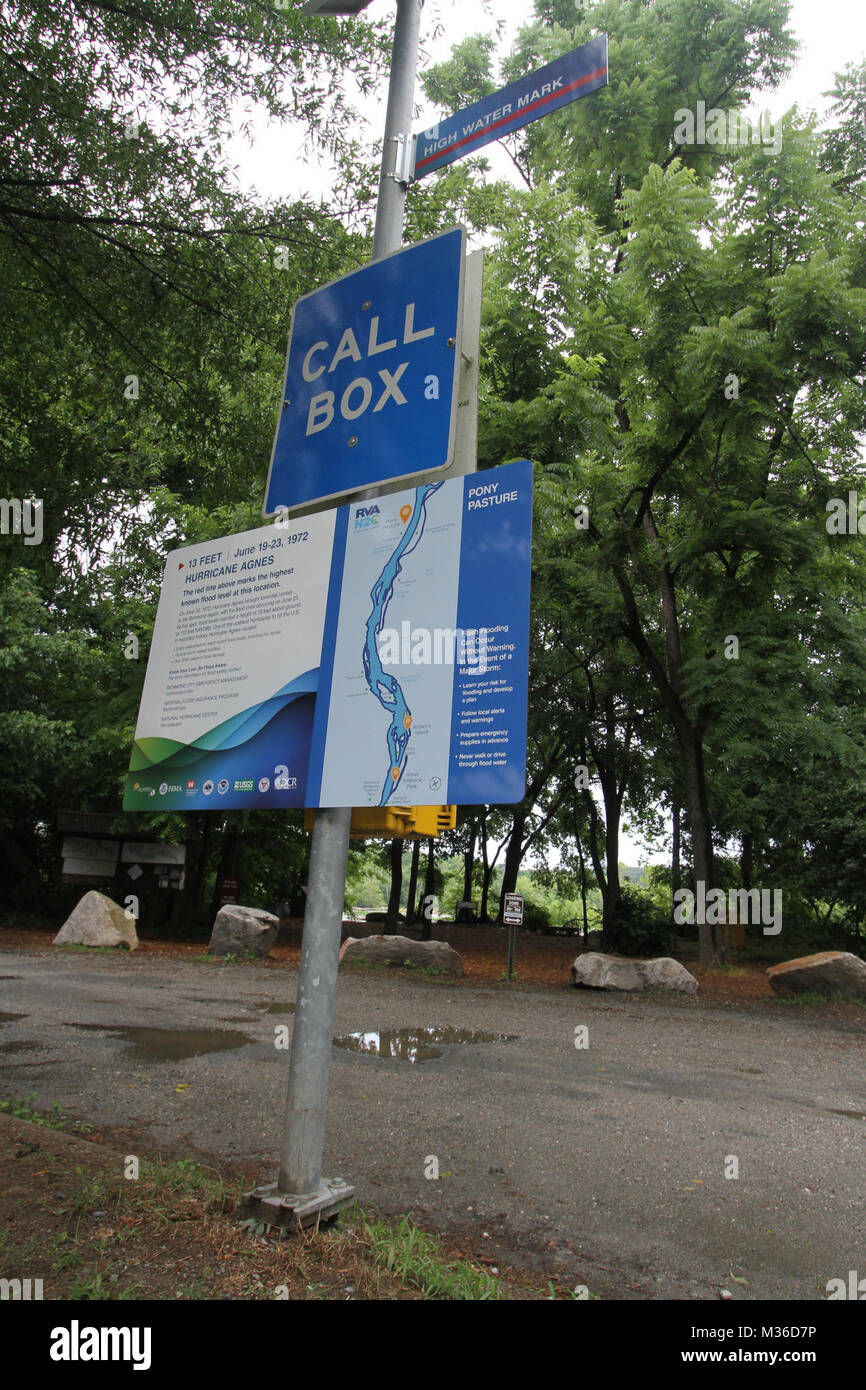 RICHMOND, Va. – Signage at Richmond’s Pony Pasture Rapid Park is unveiled here on June 23, 2016, gives visitors information about how high historic flood waters reached during Hurricane Agnes, which hit in 1972 and caused more than $140 million in damage to local area. The Richmond High Water Initiative represents a partnership between FEMA’s High Water Mark Campaign program, the FEMA Region III office, the Virginia Department of Emergency Management (VDEM), the Norfolk District, U.S. Army Corps of Engineers, the Virginia Silver Jackets and others to encourage flood awareness and steps individ Stock Photo