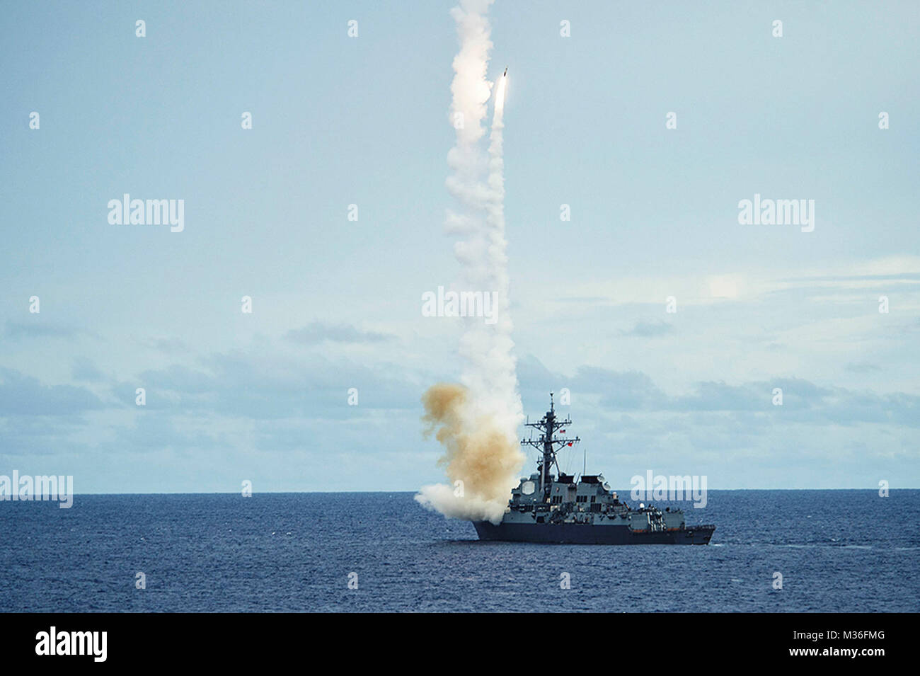 160919-N-XQ474-076 PHILIPPINE SEA (Sept. 19, 2016) The Arleigh Burke-class guided-missile destroyer USS McCampbell (DDG 85) fires a standard missile (SM 2) at a target drone as part of a surface-to-air-missile exercise (SAMEX) during Valiant Shield 2016. Valiant Shield is a biennial, U.S. only, field-training exercise with a focus on integration of joint training among U.S. forces. This is the sixth exercise in the Valiant Shield series that began in 2006. McCampbell is on patrol with Carrier Strike Group Five (CSG 5) in the Philippine Sea supporting security and stability in the Indo-Asia-Pac Stock Photo