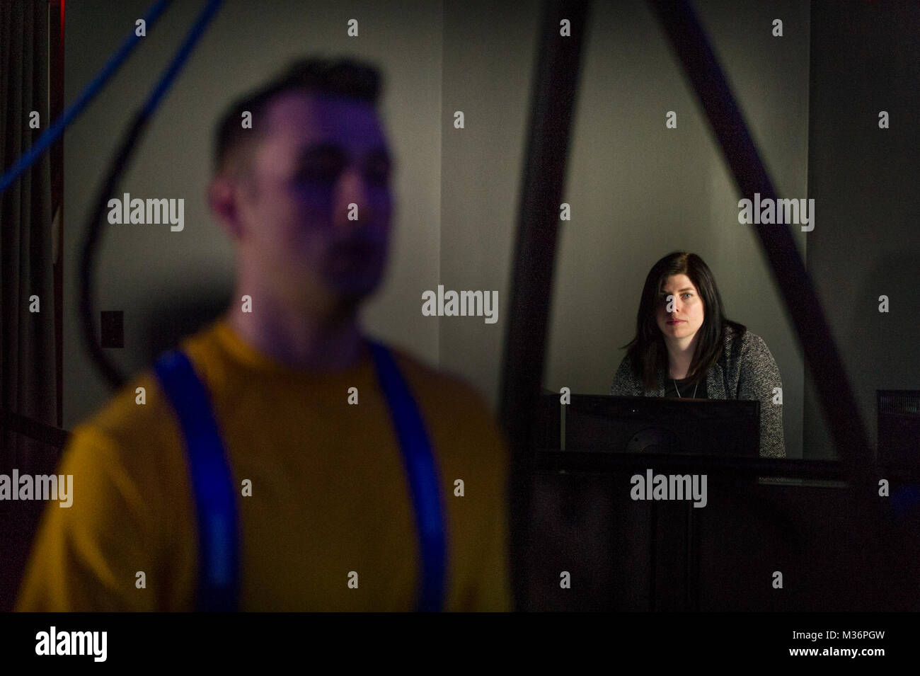 A Traumatic Brain Injury (TBI) patient, walks through a virtual reality