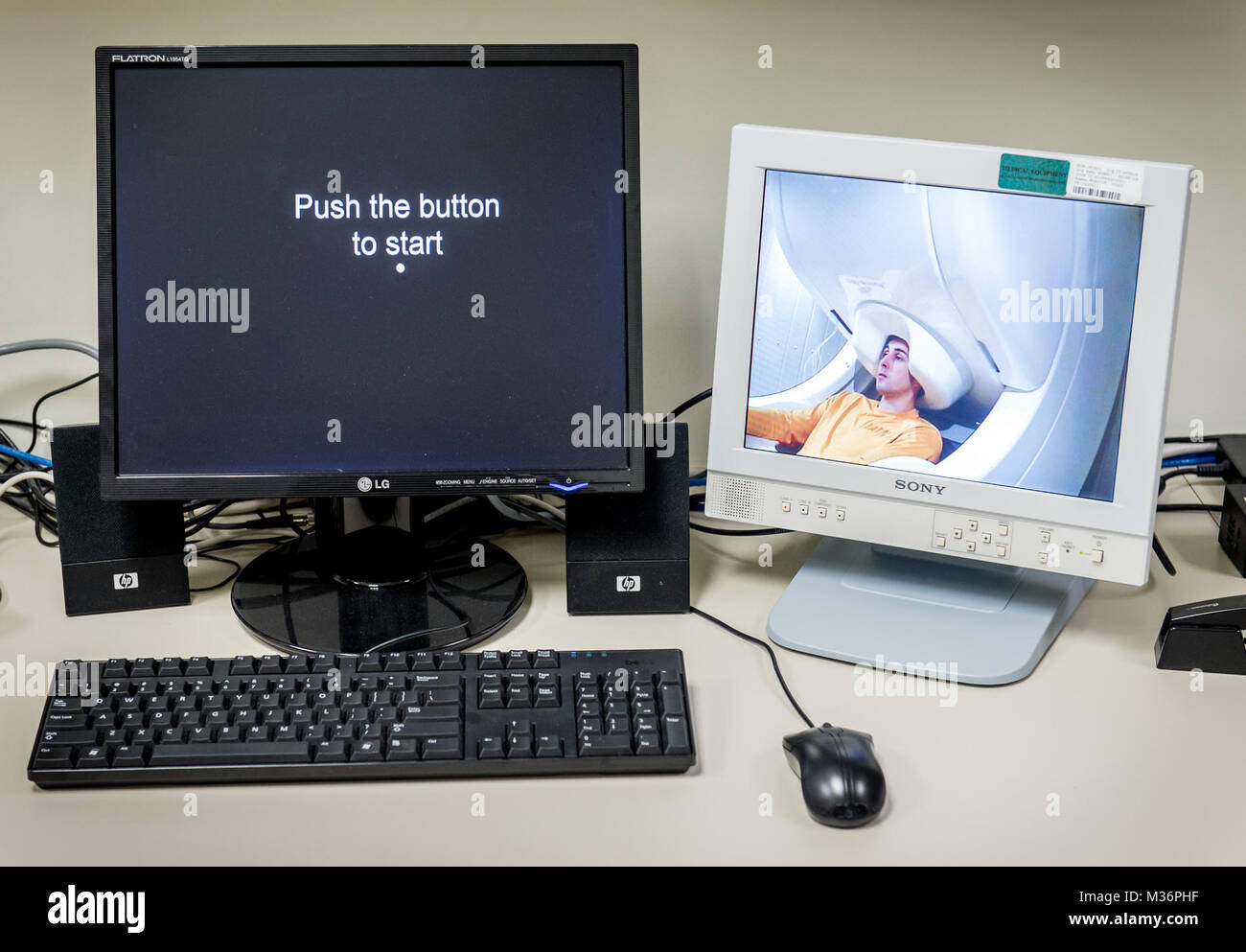 A subject is seen on a monitor in the Magnetoencephalography (MEG ...