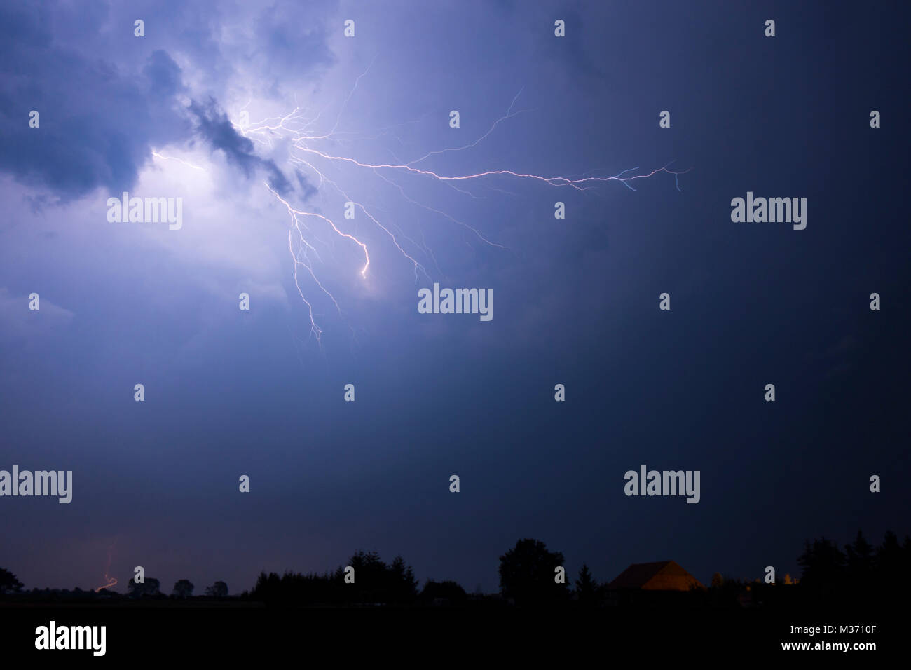 Lightning in a stormy night Stock Photo - Alamy
