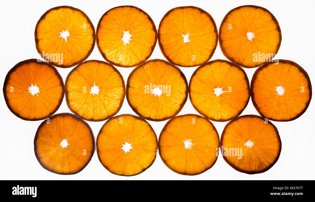 Orange slices in a geometric pattern. Backlit for a fresh effect Stock ...