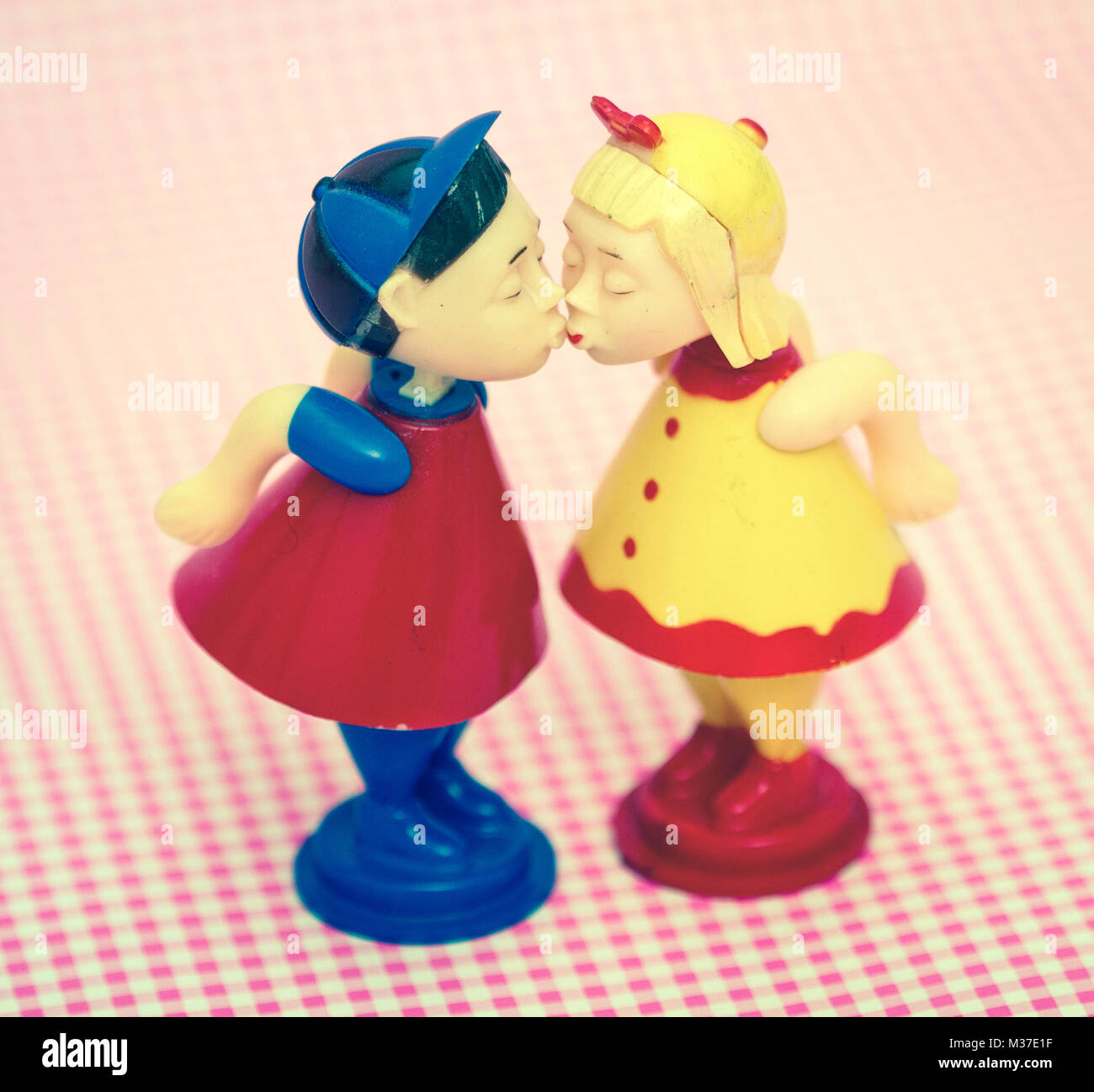 two retro kissing toys kiss close up Stock Photo Alamy