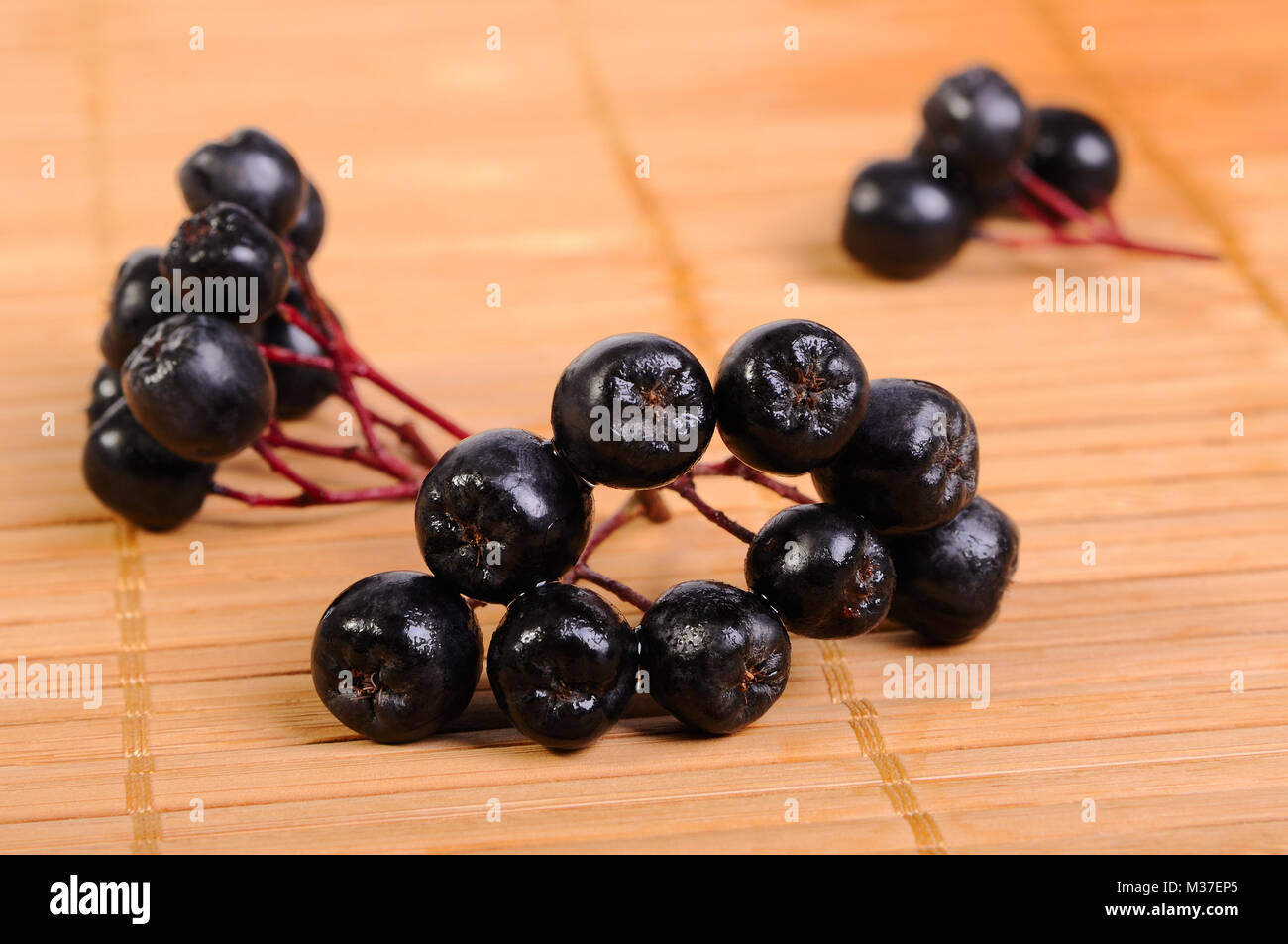 Fruits chokeberry on a mat Stock Photo