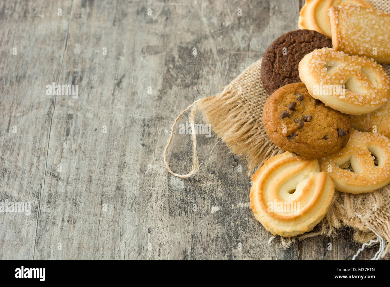 Assorted butter cookies on wooden table Stock Photo Alamy