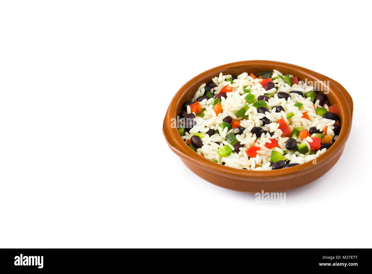Traditional cuban rice, black beans and peppers isolated on white background. Moros y cristianos