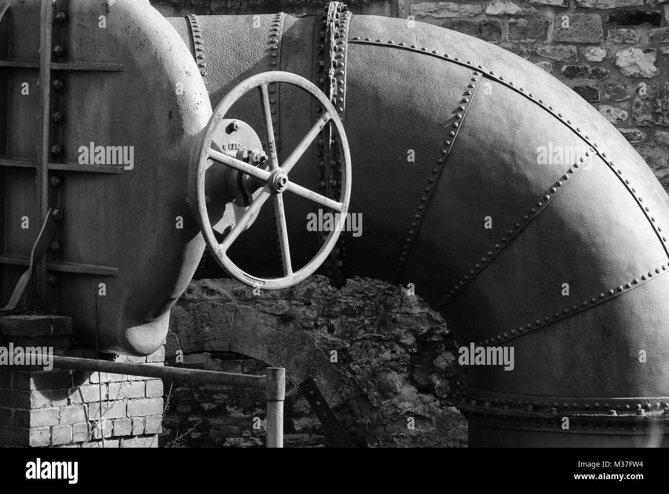 Part of some restored turbine machinery at the 19th century Cressbrook Mill, Derbyshire, UK Stock Photo