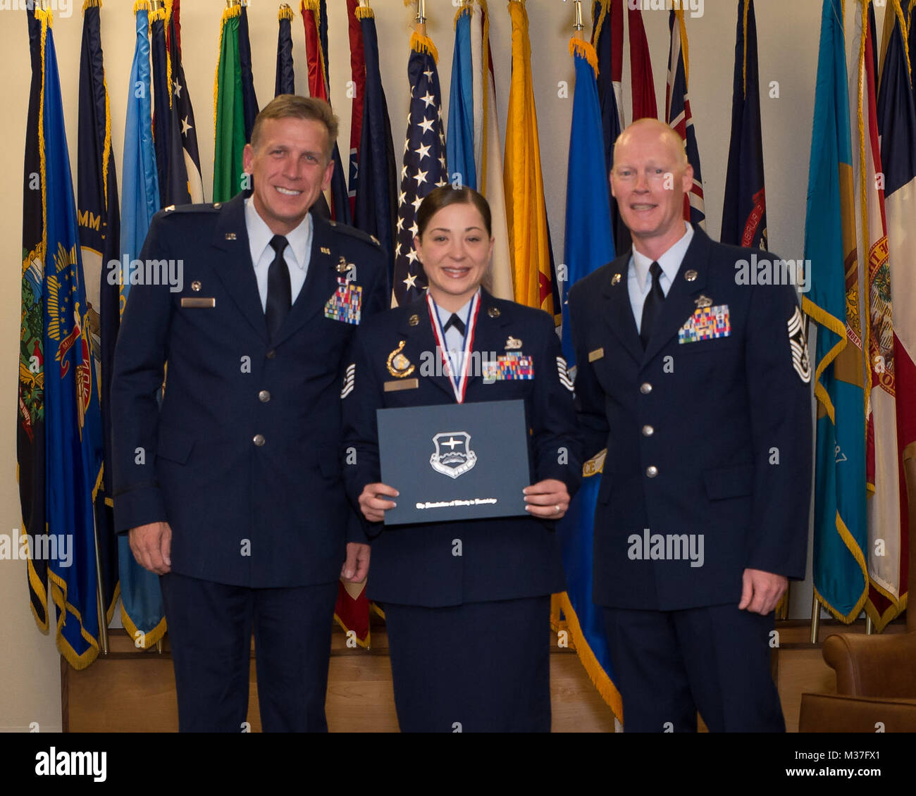 U.S. Air Force Airmen assigned to the 153rd Airlift Wing, Wyoming Air National Guard recognized for completing Community College of the Air Force degree, May 6, 2017 at the Trails End club in Cheyenne, Wyoming. More that 60 Airmen assigned to the wing received their Associate of Science degree in their Air Force specialty. (U.S. Air National Guard photo by Senior Master Sgt. Charles Delano/released) 170506-Z-PA223-3014 by wyoguard Stock Photo