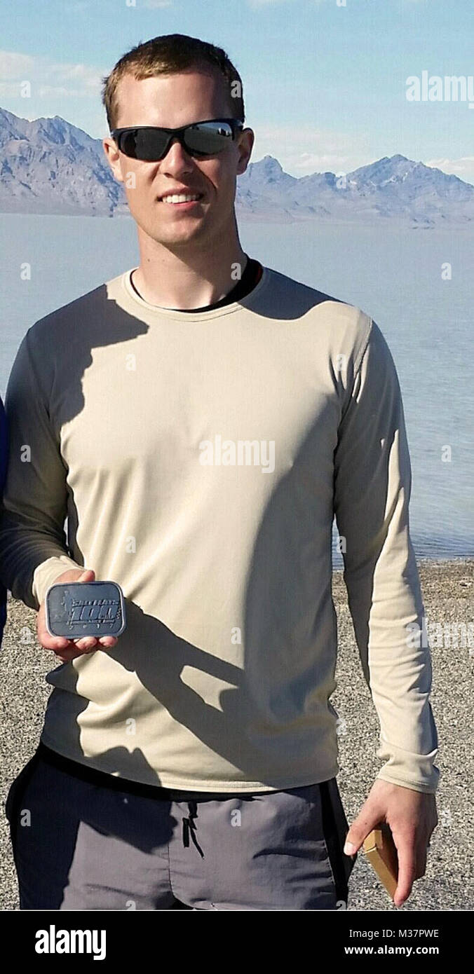 First Lt. Ethan Valiquette poses with his Finisher's Belt Buckle