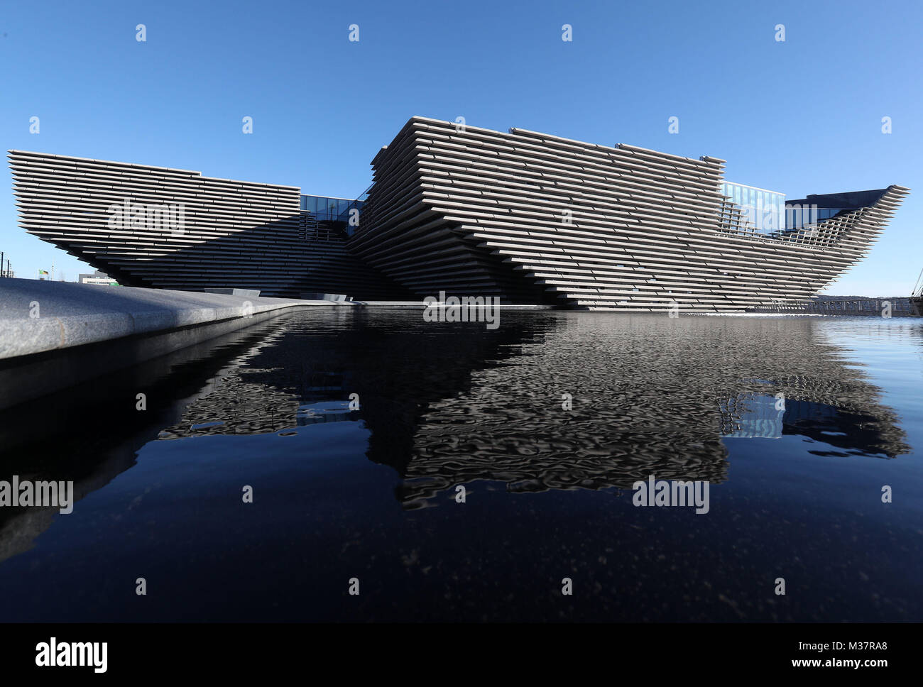 A general view of the finished exterior of the new eighty million pound V&amp;A Dundee museum during a visit by Japanese architect Kengo Kuma(not pictured). The designer met workers as the focus moves to the interior of the V&amp;A, fitting out gallery spaces, a cafe and a restaurant ahead of its opening in September. Stock Photo