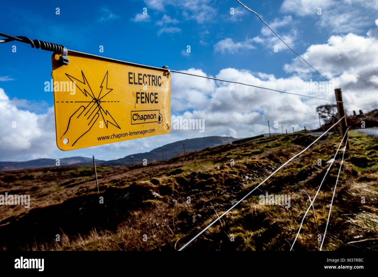 Electric fence Chapron lemenager signage warning for safety in rural Ireland Stock Photo