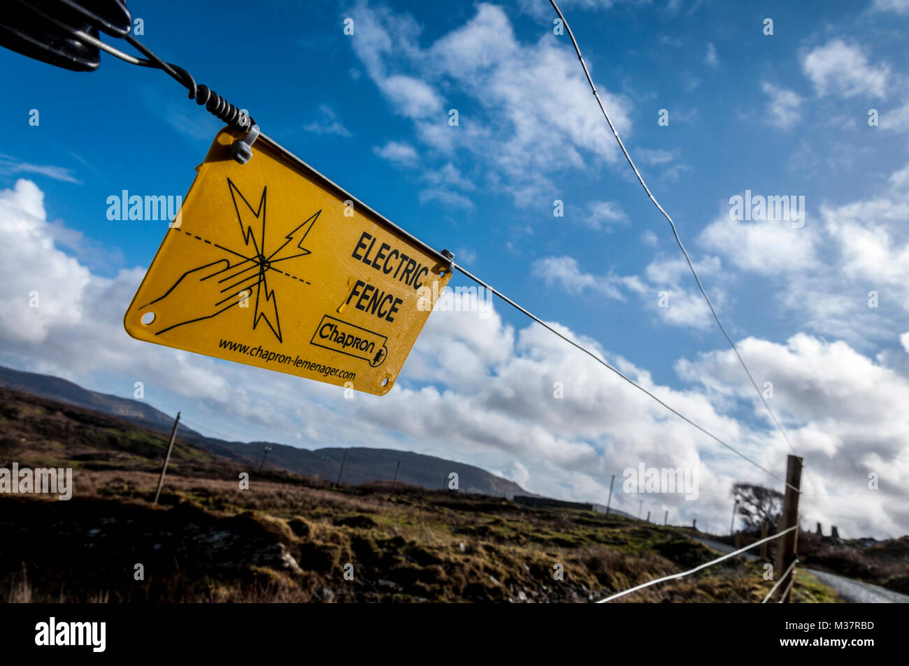 Electric fence Chapron lemenager signage warning for safety in rural Ireland Stock Photo