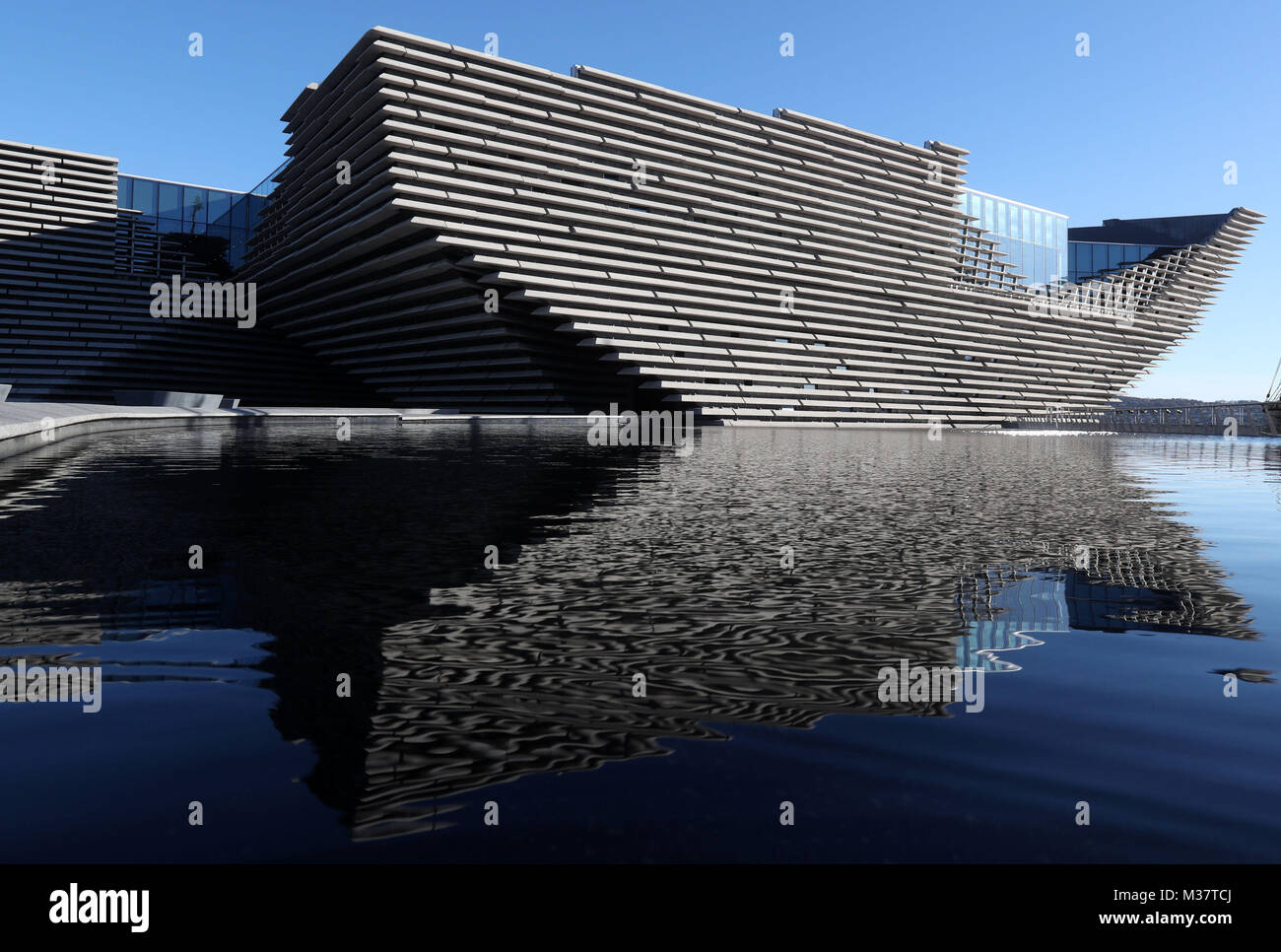 A general view of the finished exterior of the new eighty million pound V&A Dundee museum during a visit by Japanese architect Kengo Kuma(not pictured). The designer met workers as the focus moves to the interior of the V&A, fitting out gallery spaces, a cafe and a restaurant ahead of its opening in September. Stock Photo