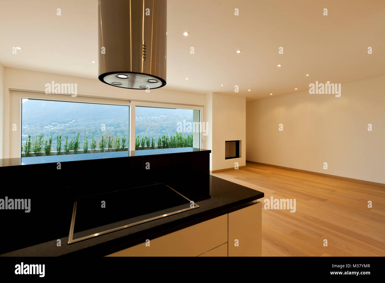 large room with kitchen island, window view Stock Photo