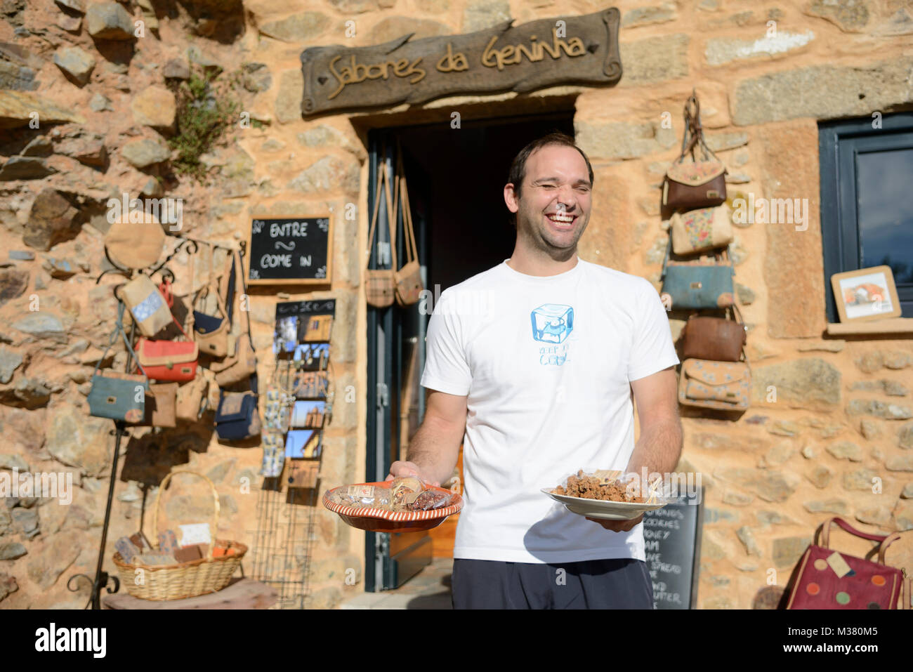 Employee Of Sabores Da Geninha Souvenir Shop Selling Traditional employee-of-sabores-da-geninha-souvenir-shop-selling-traditional