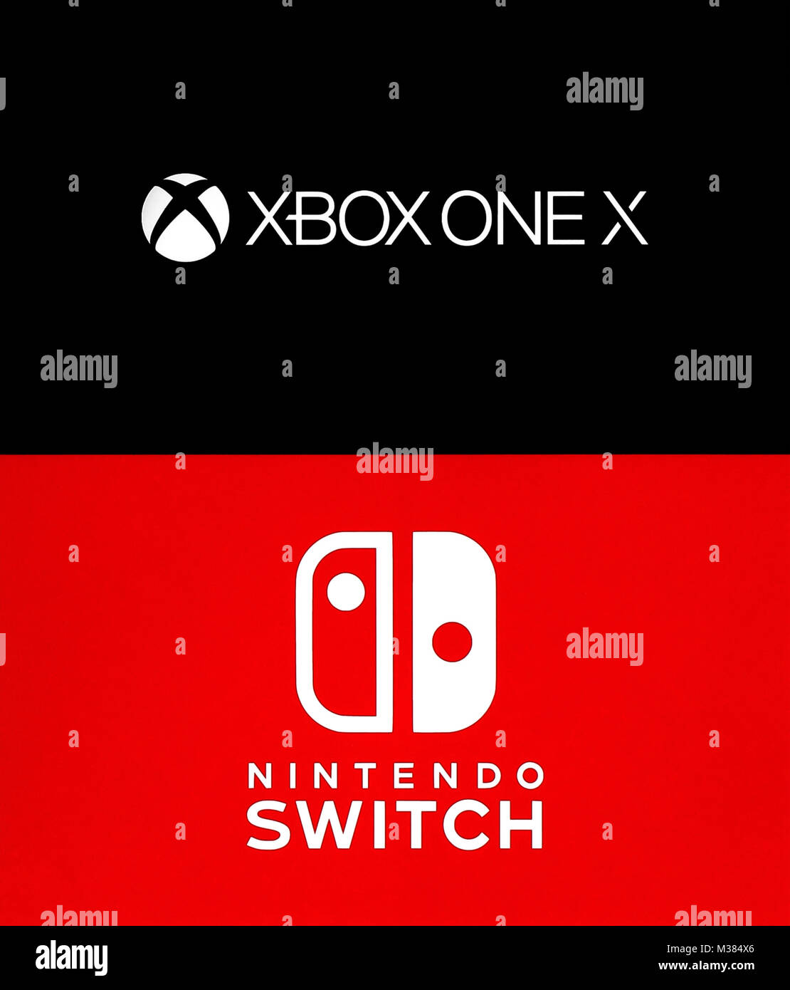 Kiev, Ukraine - August 21, 2017: Collection of popular game consoles logos: XBox One X and Nintendo Switch, printed on white paper Stock Photo