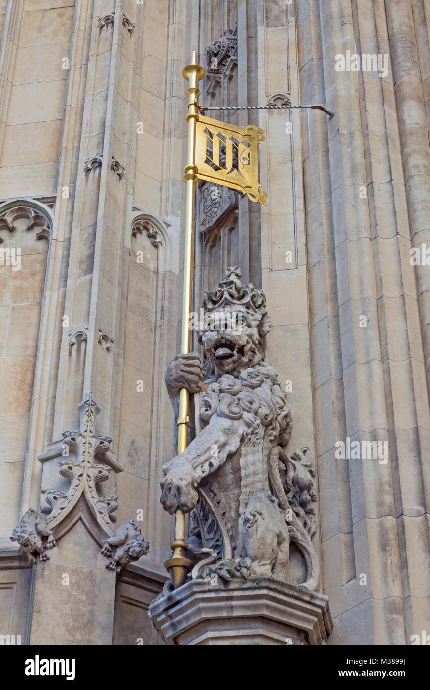 A lion rampant at the base of the Victoria Tower at the Palace of Westminster Stock Photo