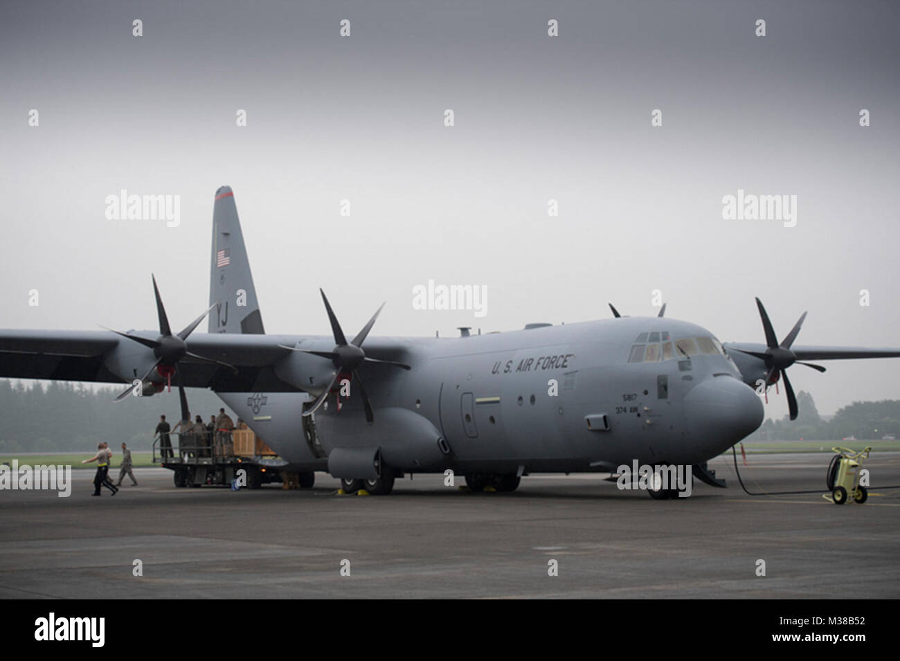 Crew members from the 36th Airlift Squadron unload pallets at Yokota Air Base, Japan, Aug. 10, 2017. This is the 374th Airlift Wing’s fourth new C-130J as the base transitions from the H model. The new C-130J is 81%% quieter during takeoff, 14%% faster, can travel 1,287 km further, and can carry 4,090 kg more than its predecessor, the C-130H Hercules. (U.S. Air Force photo by Yasuo Osakabe) 36th Airlift Squadron continues to transition to the new C-130J aboard Yokoa Air Base by #PACOM Stock Photo