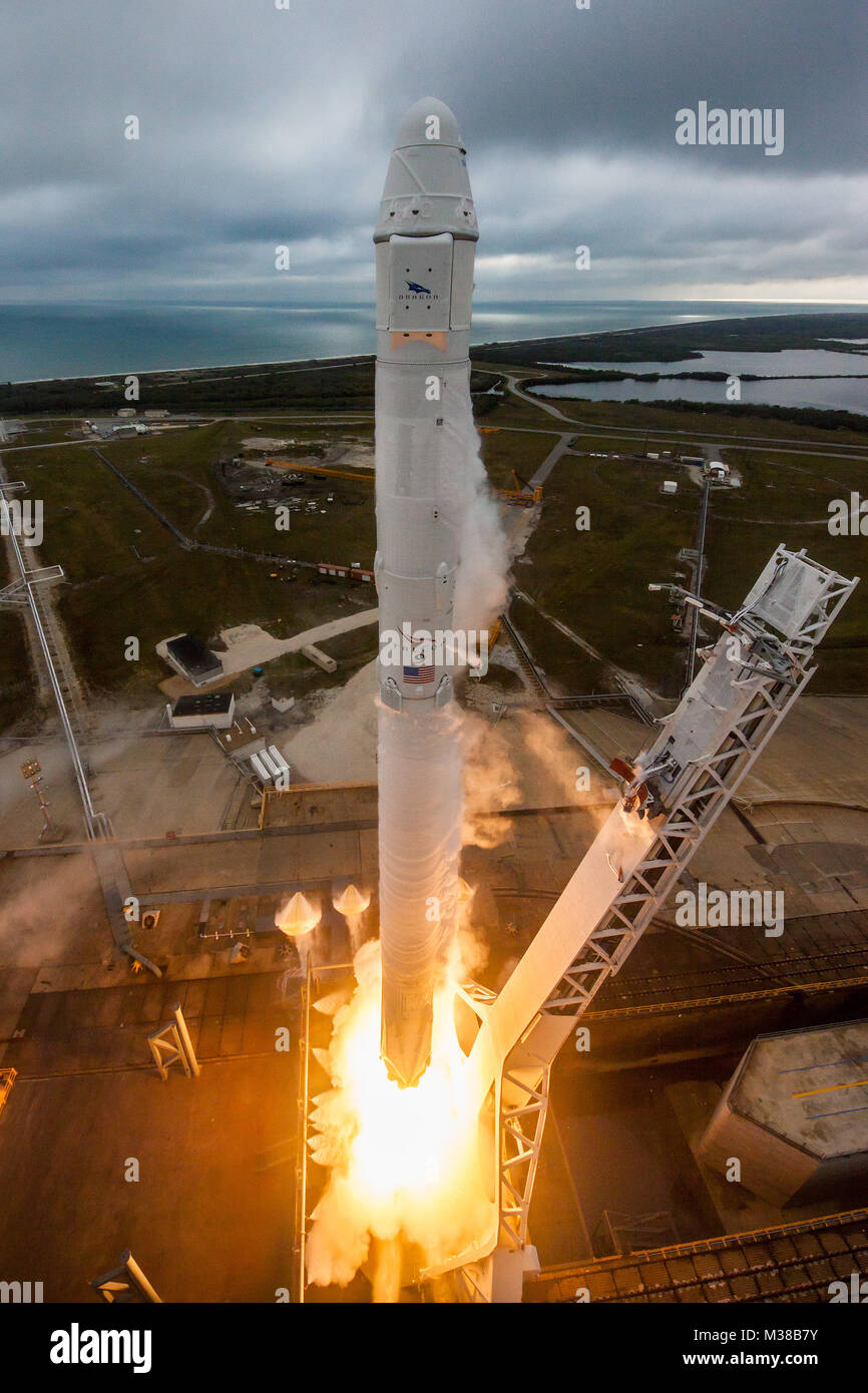 Falcon 9 and Dragon lift off from Launch Pad 39A for CRS-10  s 1 Stock Photo
