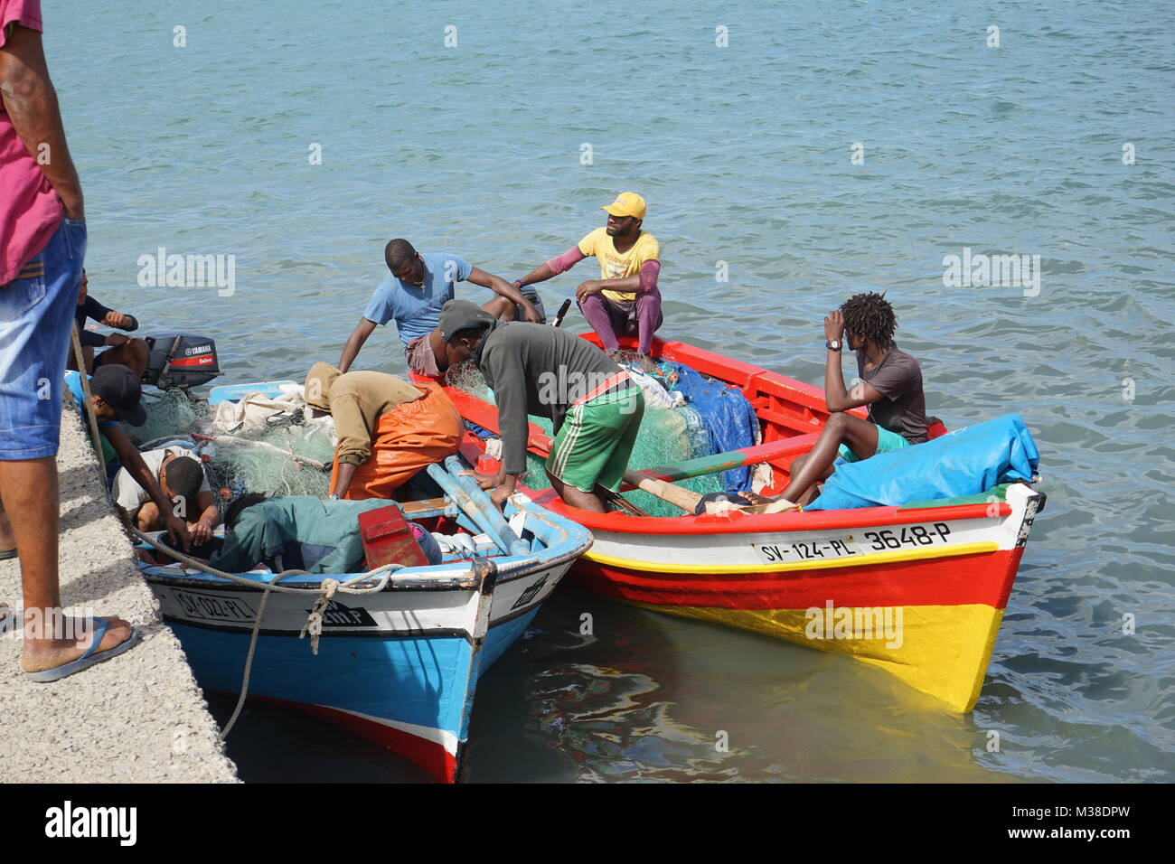 Fishermen unloading Boats, Fish Market, Mindelo, Cape Verde Stock Photo
