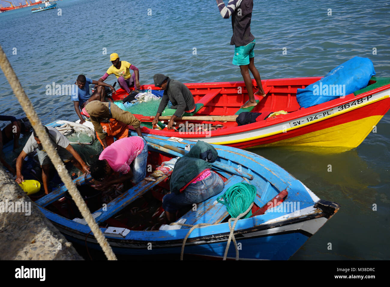 Fishermen unloading Boats, Fish Market, Mindelo, Cape Verde Stock Photo