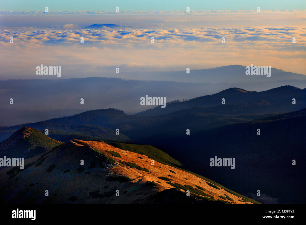 Poland, Tatra Mountains, Zakopane - Urhocie Kasprowe and Kopa Magury peaks with Beskidy Mountains in background Stock Photo