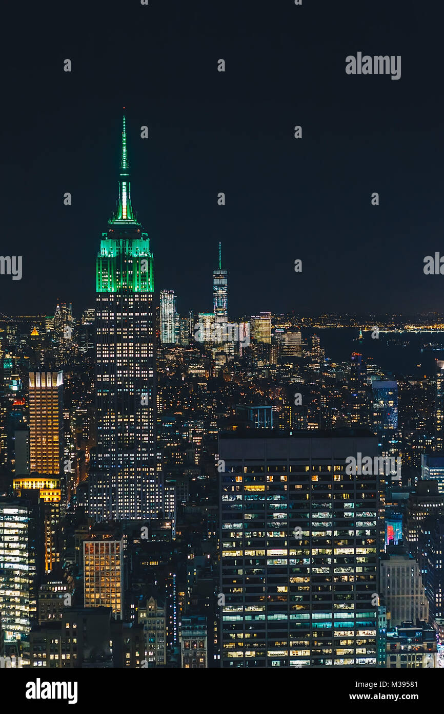 Aerial view night panorama of New York City downtown with urban ...