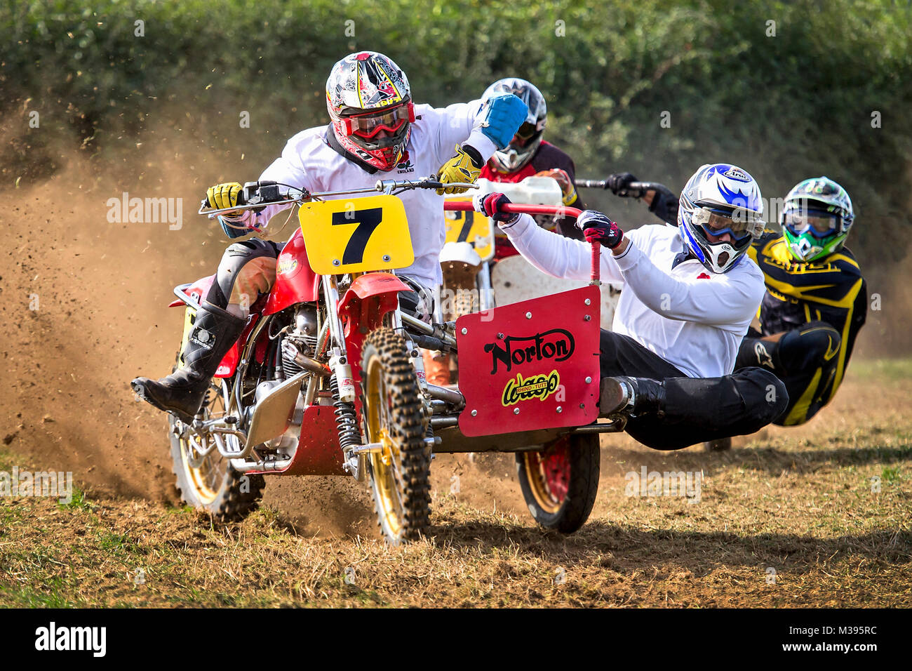 Dorset Classic Scramble - competing scramble bikes with side-cars,  travelling at speed. Stock Photo